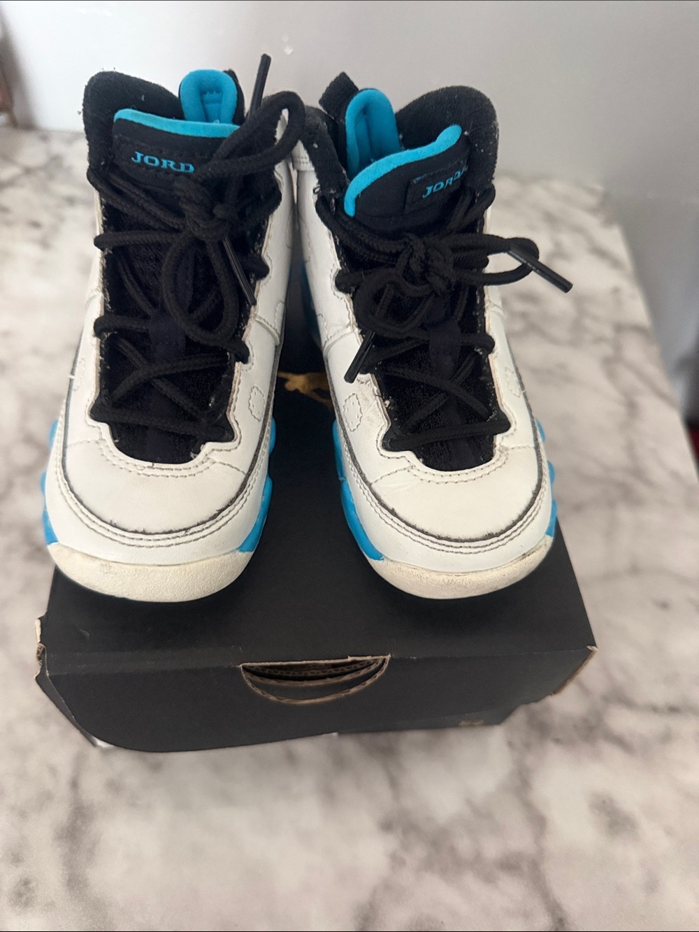 Jordan Kids White and Blue High-Top Sneakers